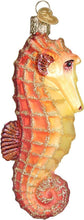 Load image into Gallery viewer, OLD WORLD CHRISTMAS ORANGE SEA HORSE NAUTICAL GLASS CHRISTMAS ORNAMENT 12607