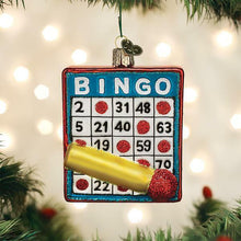Load image into Gallery viewer, OLD WORLD CHRISTMAS BINGO CARD GLASS CHRISTMAS ORNAMENT 44137