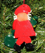 Load image into Gallery viewer, KURT ADLER VINTAGE 1990's CLAY DOUGH SANTA CLAUS HOLDING GIFT CHRISTMAS ORNAMENT
